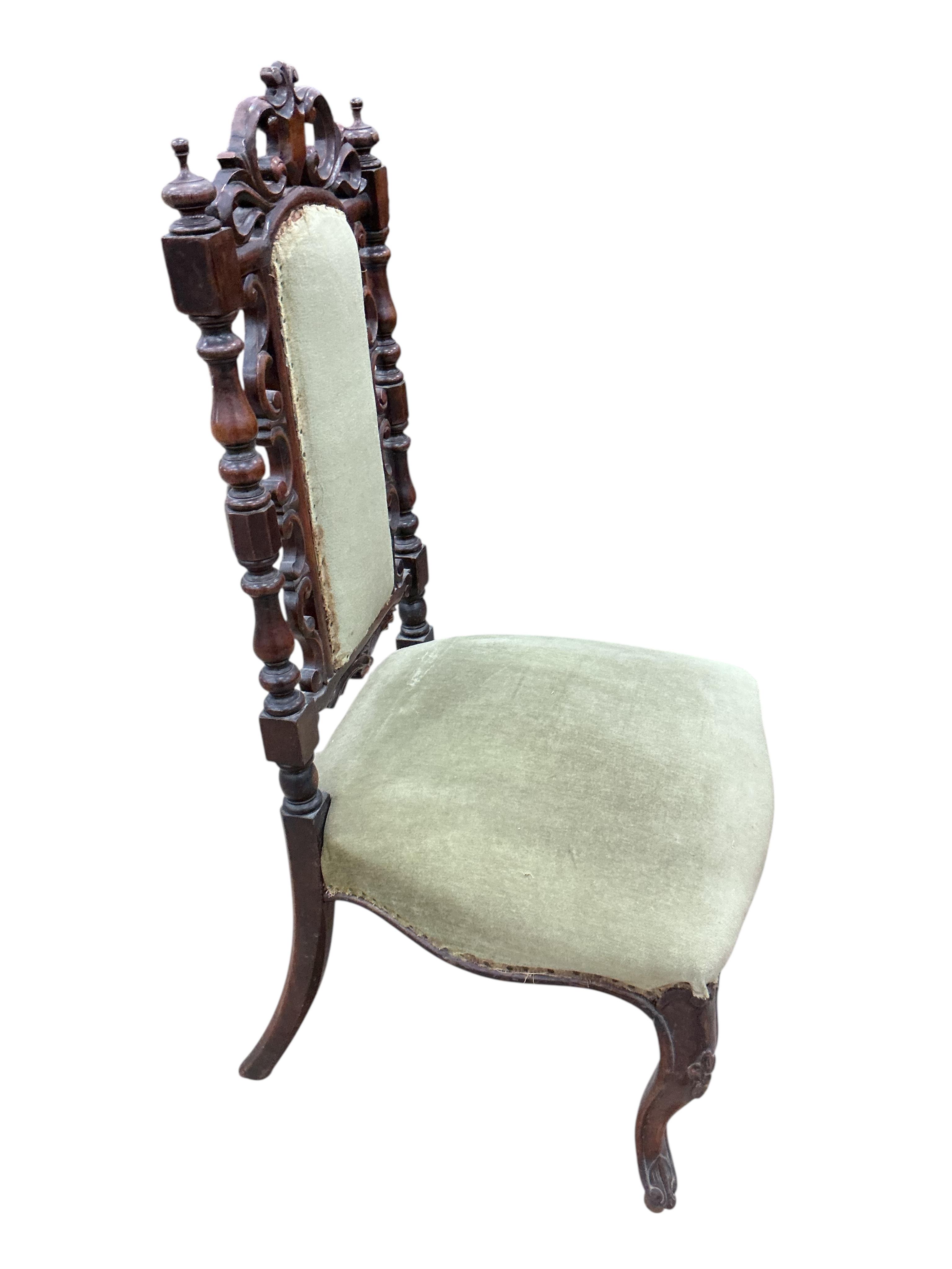 A pair of Victorian carved walnut side chairs, width 46cm, depth 40cm, height 98cm